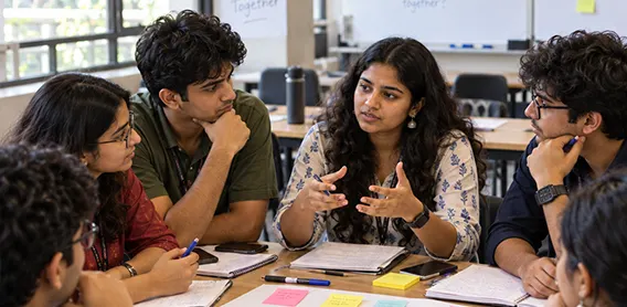 Audience members listening during a team session