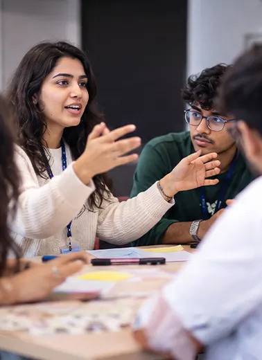 Team members learning together at a workshop