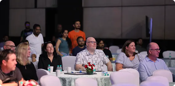 Audience members listening during a team session