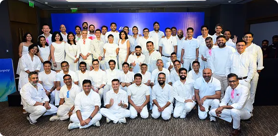 Participants posing together after a corporate workshop